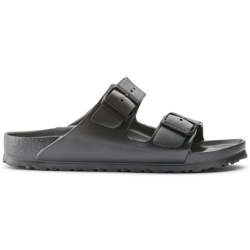 Black two-strap slide sandal with adjustable buckles and contoured footbed for comfort and casual wear.