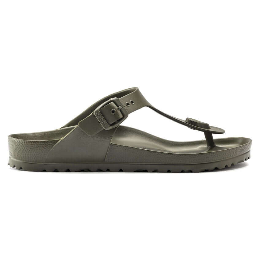 Olive green thong sandal with buckle on side profile, featuring a comfortable sole and minimalist design