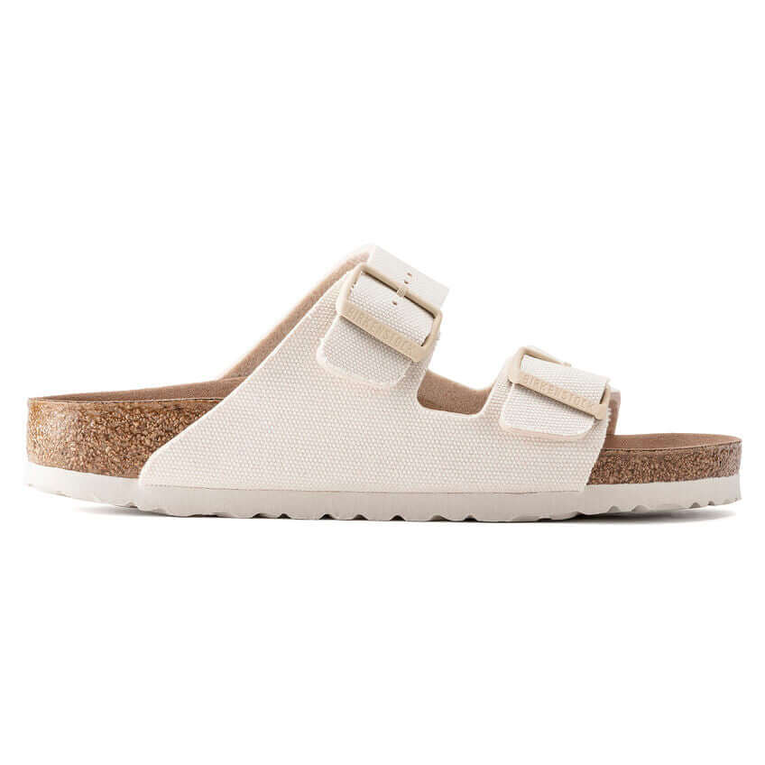 White cork footbed sandal with double buckle straps on a white background.
